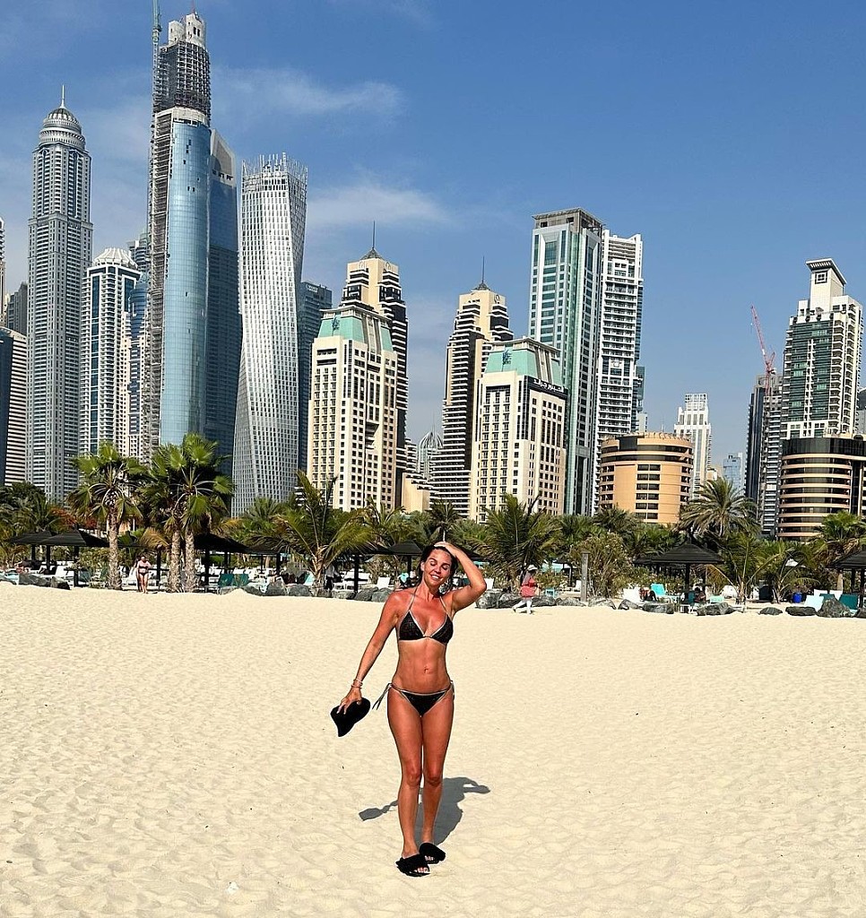 Danielle Lloyd showcases her toned abs in a skimpy Louis Vuitton bikini  while holidaying in Dubai