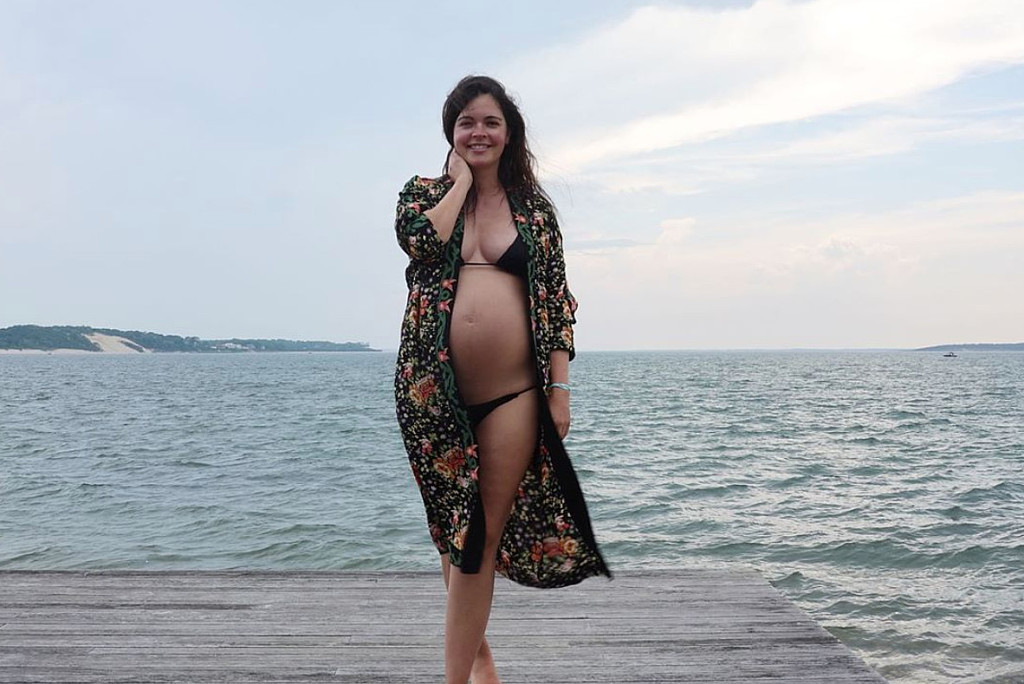 Bikini News Daily - Katie Lee showed her baby bump and appeared to be  glowing as she modeled a tiny black bikini